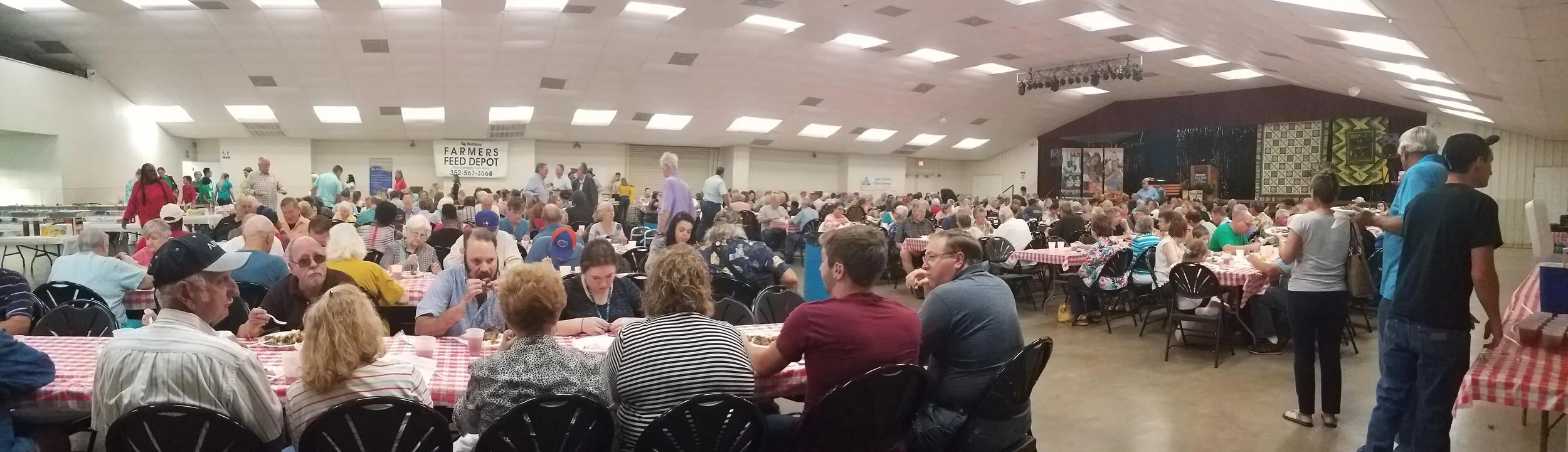 You can see how far away we were from the front of the auditorium. Trying to get their attention was quite a feat.