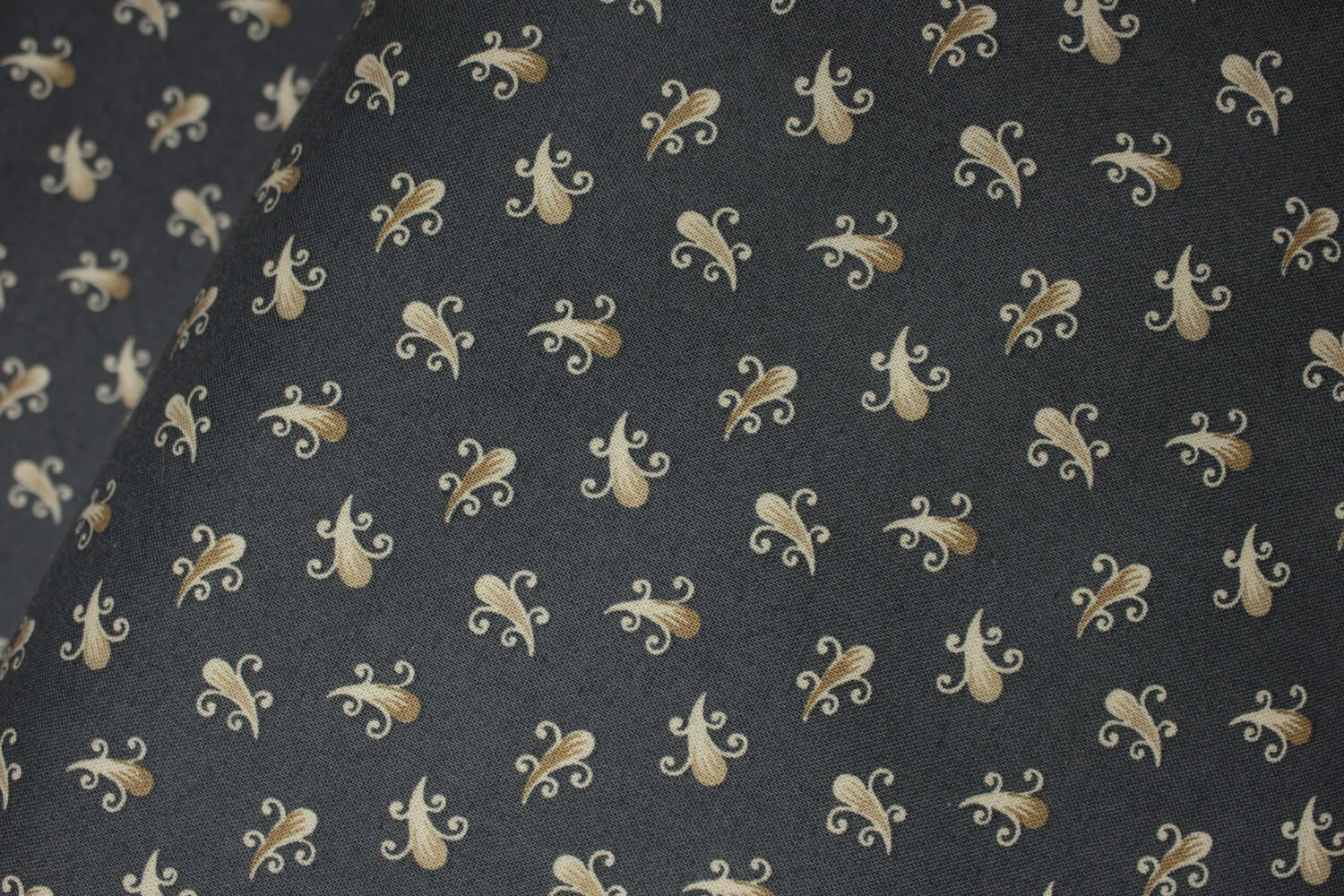 Tan Teardrop with Spirals on Dark Gray: Clayton by Nancy Gere for Windham Fabrics