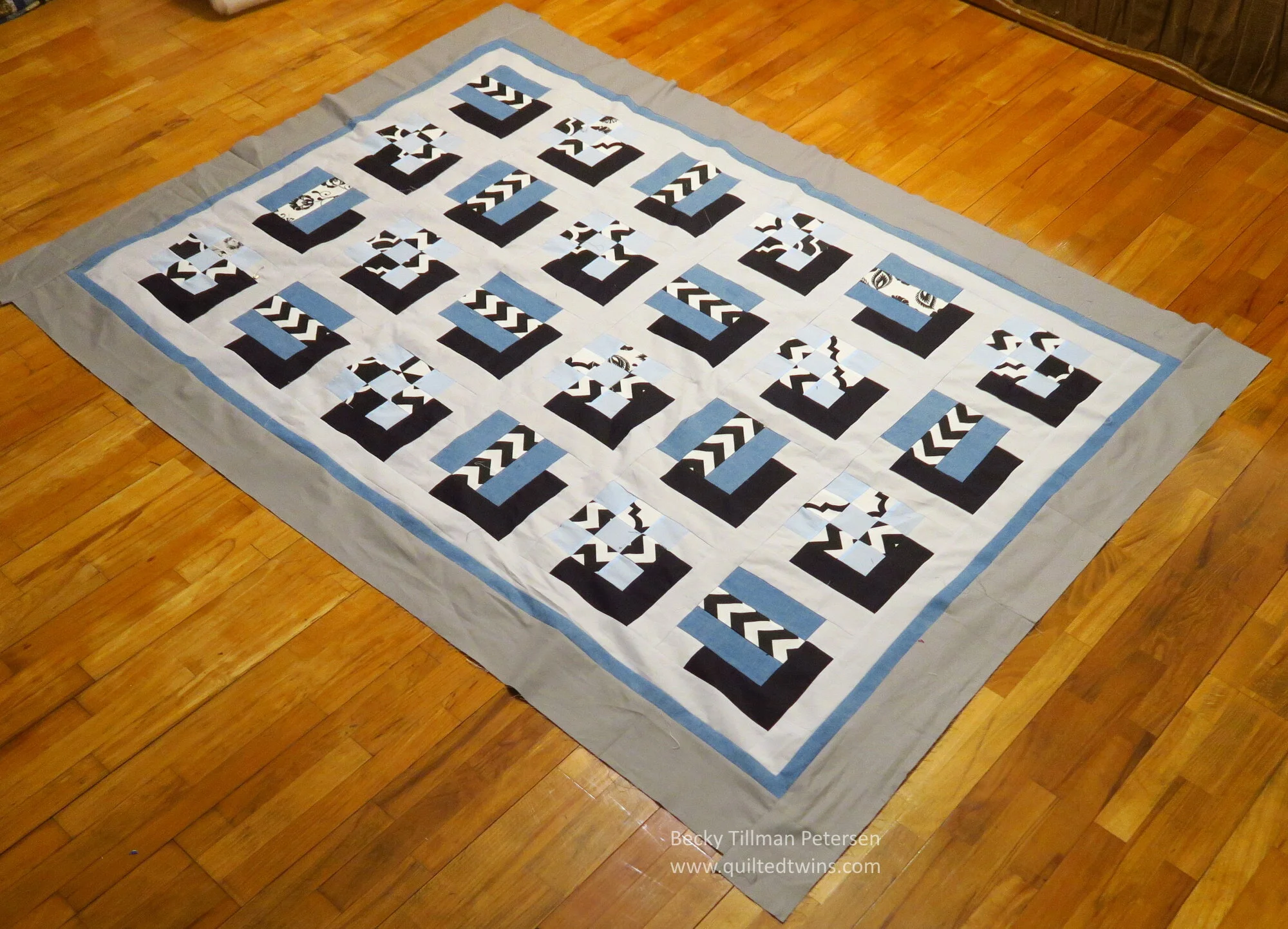 Geometrics 12 - blue and gray lap size quilt