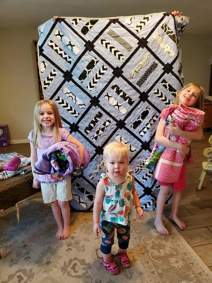 Delivery - my three nieces get their quilts