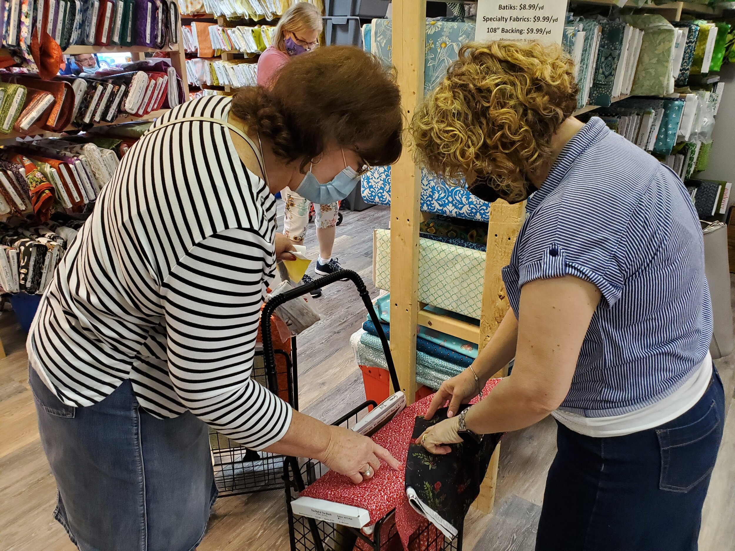 What’s the difference between shopping in the Quilted Twins store and online?