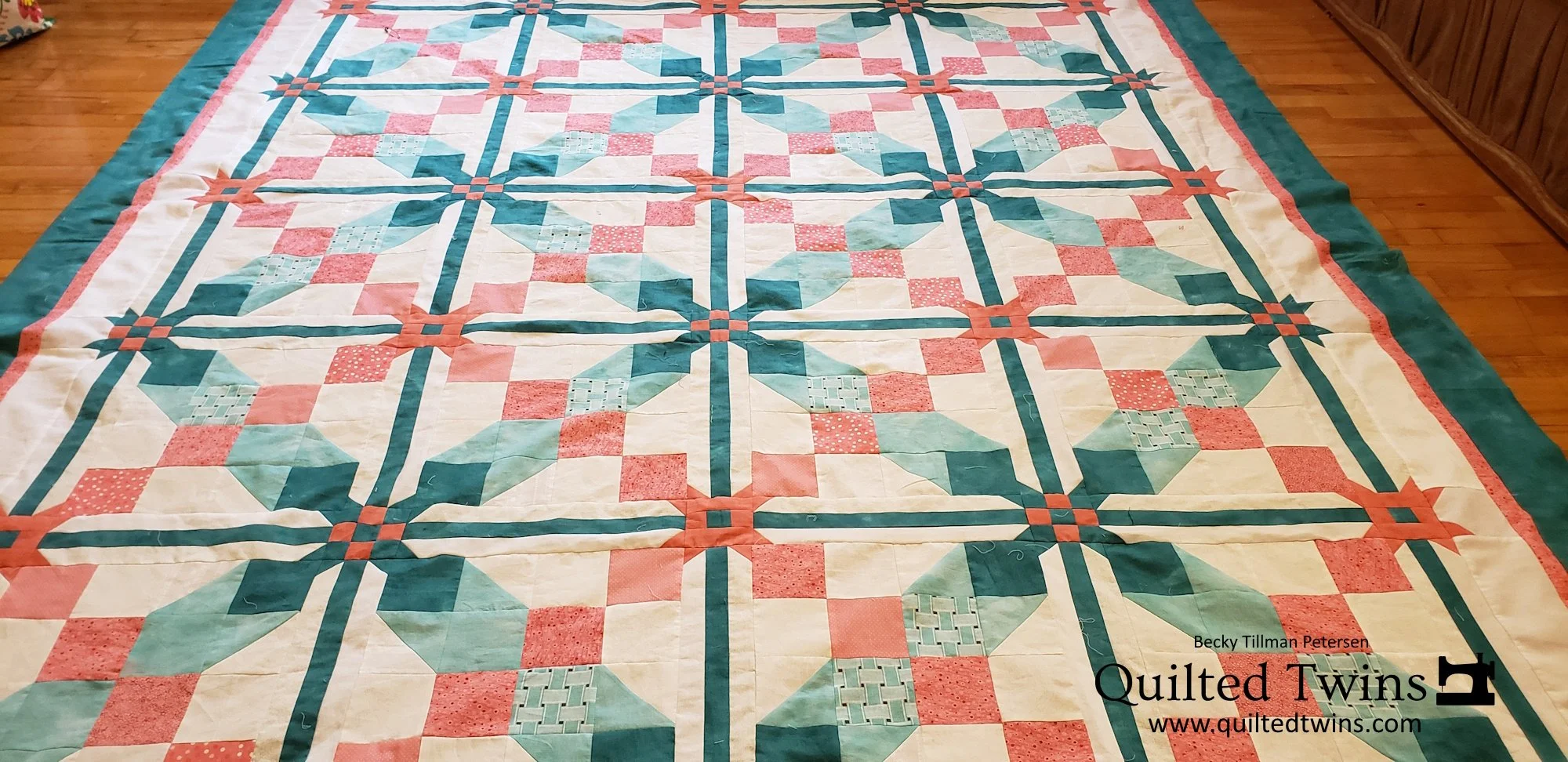 Teal, coral and Caribbean quilt top