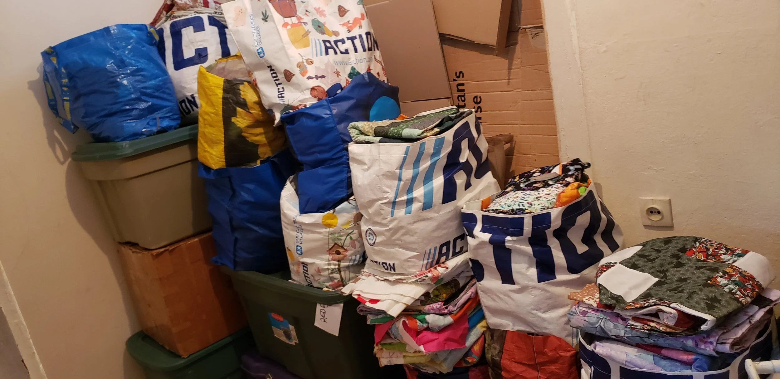 Inventory of Charity Quilt Tops in the Church Building - Wow!