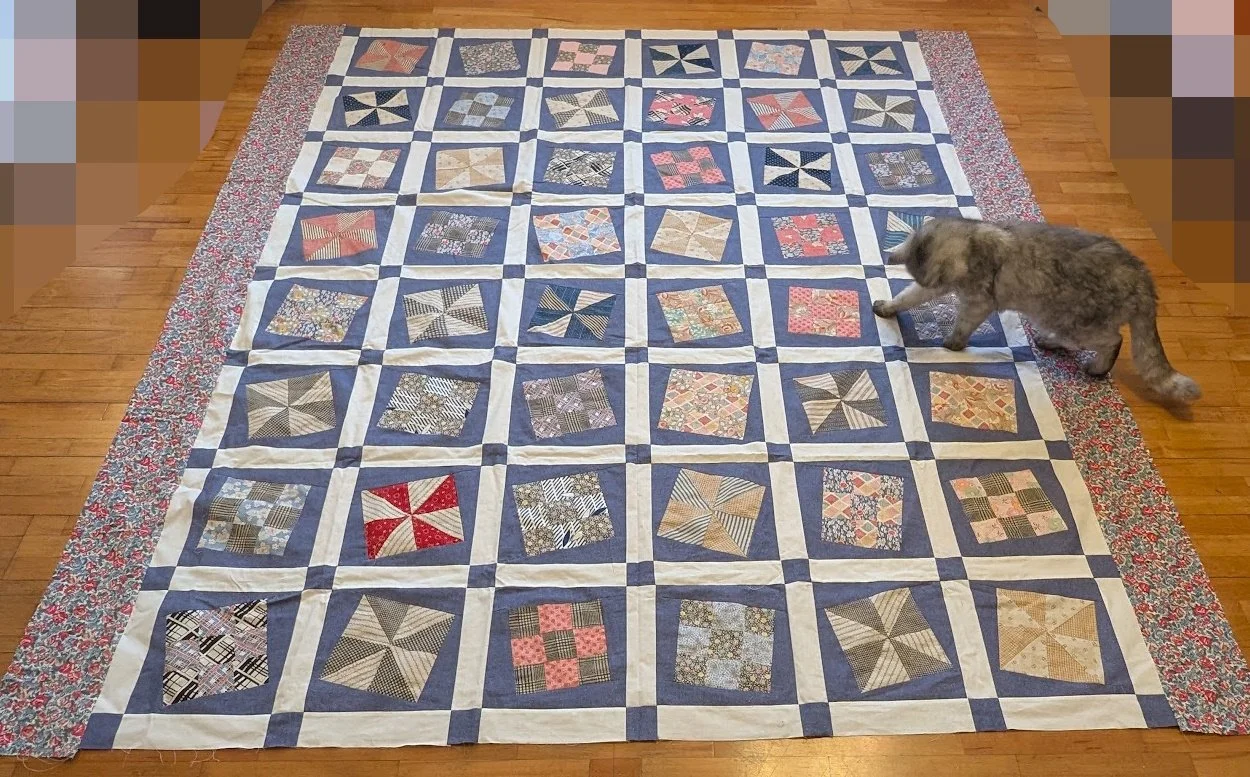 I was sent these very old blocks several years ago now and I made the wonky blocks but the finished top was not the right size so I added borders to make it a double.