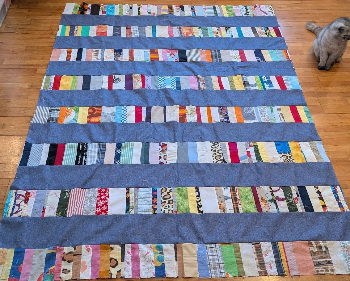 I take the strips that Ewa and her mom make and add a 6.5" strip to them and make these strippy tops.