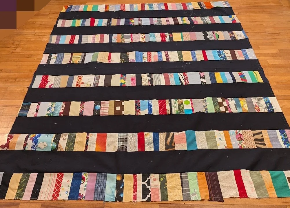 I used strips made from Ewa and her mom and added the long big strips of menswear  to make a top.