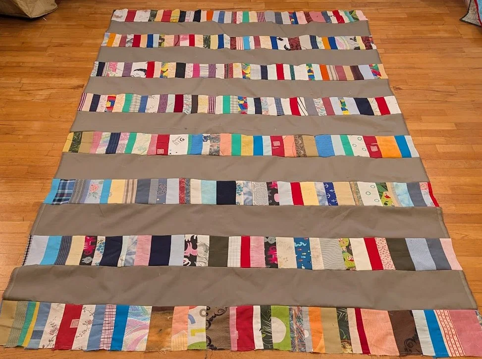 I used strips made from Ewa and her mom and added the long big strips of menswear  to make a top.