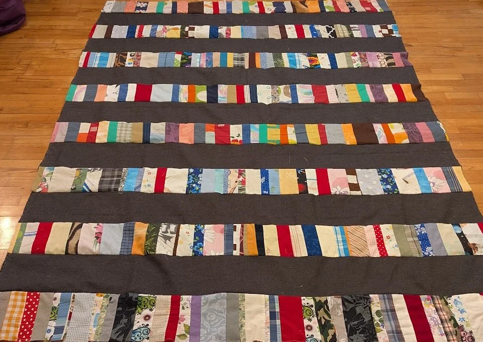 I used strips made from Ewa and her mom and added the long big strips of menswear  to make a top.