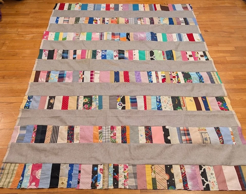 I used strips made from Ewa and her mom and added the long big strips of menswear  to make a top.