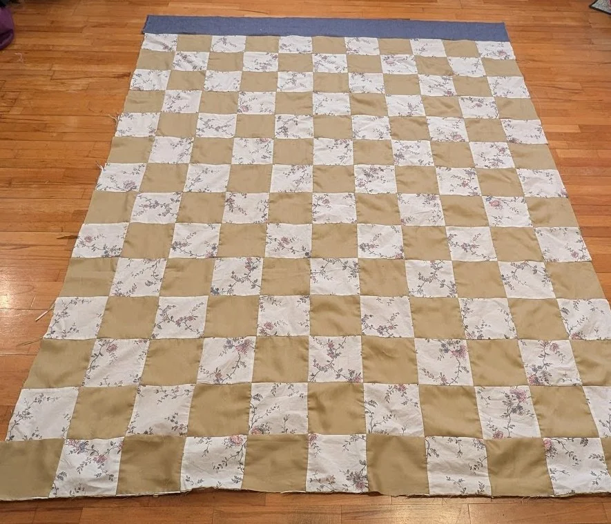 Top received that was a bit too wide and too short so I cut off one row off the side and put it on one end and then added another border.