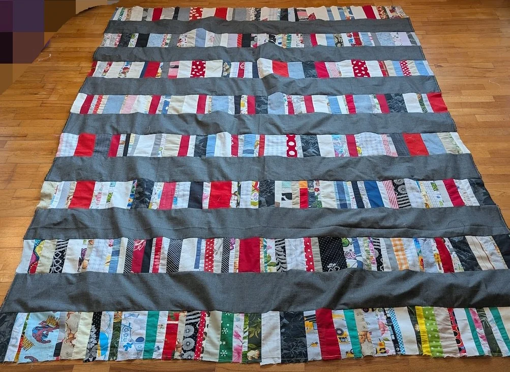 I made these strip tops out of strips rolls that Ewa and her mom made and I added it to the menswear I cut into 6.5" xWOF.