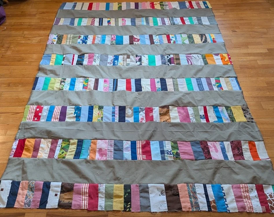 I made these strip tops out of strips rolls that Ewa and her mom made and I added it to the menswear I cut into 6.5" xWOF.