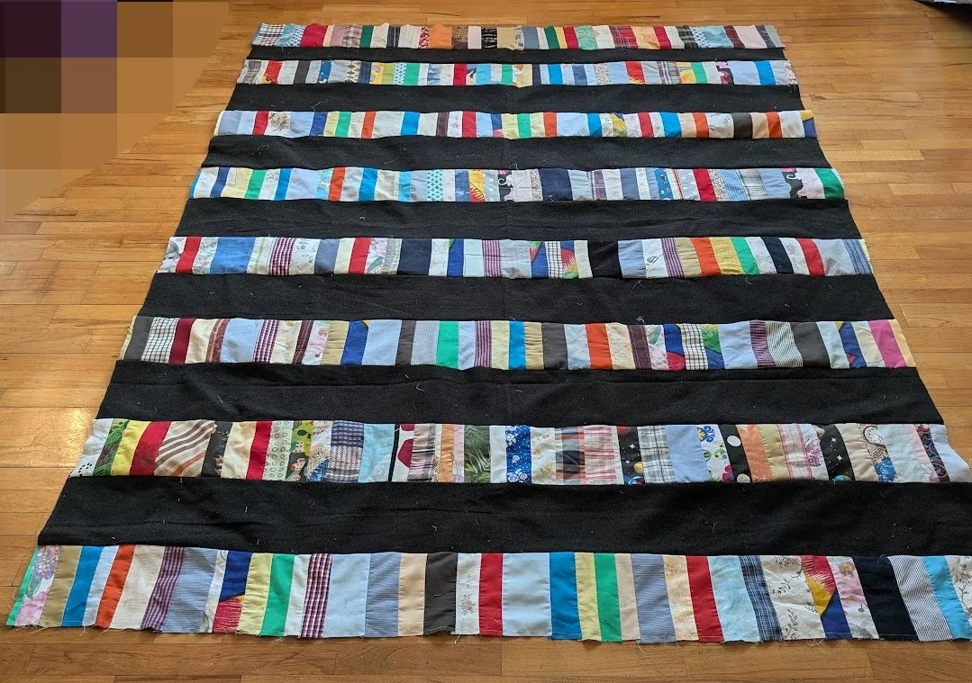 I made these strip tops out of strips rolls that Ewa and her mom made and I added it to the menswear I cut into 6.5" xWOF.