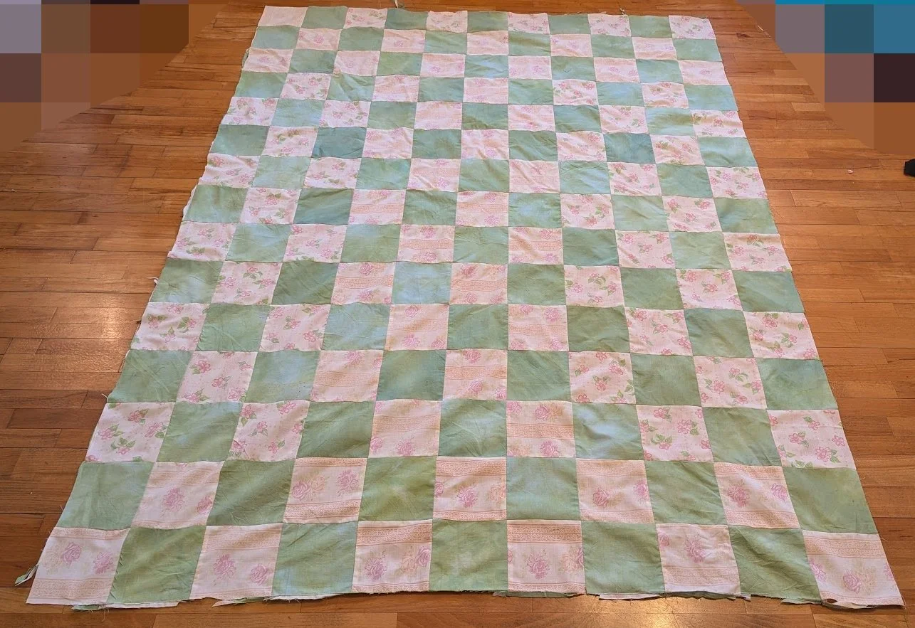 I trimmed one row of the squares and add the trimming to the top or bottom.