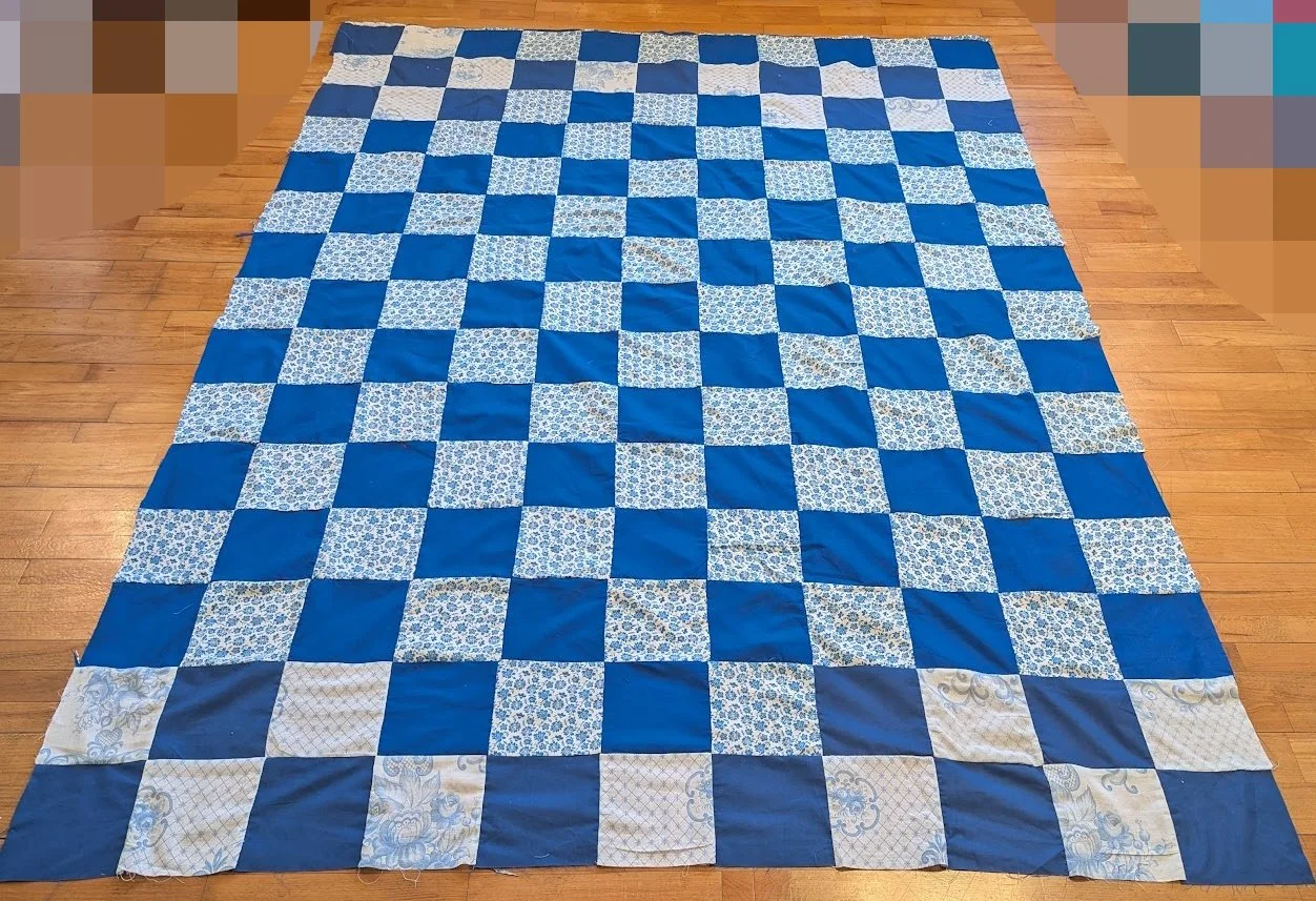 I trimmed one row of the squares and add the trimming to the top or bottom.