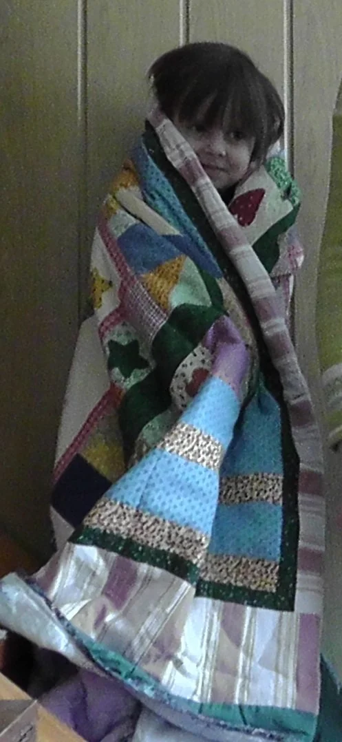 girl with quilt.jpg
