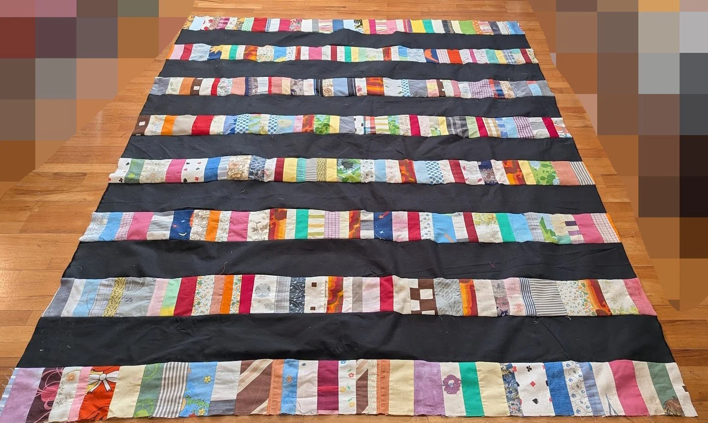 I added the strips to 6.5" cuts from the menswear fabric - the whole top