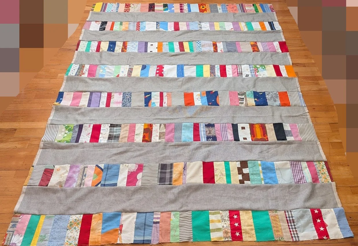 I added the strips to 6.5" cuts from the menswear fabric - the whole top