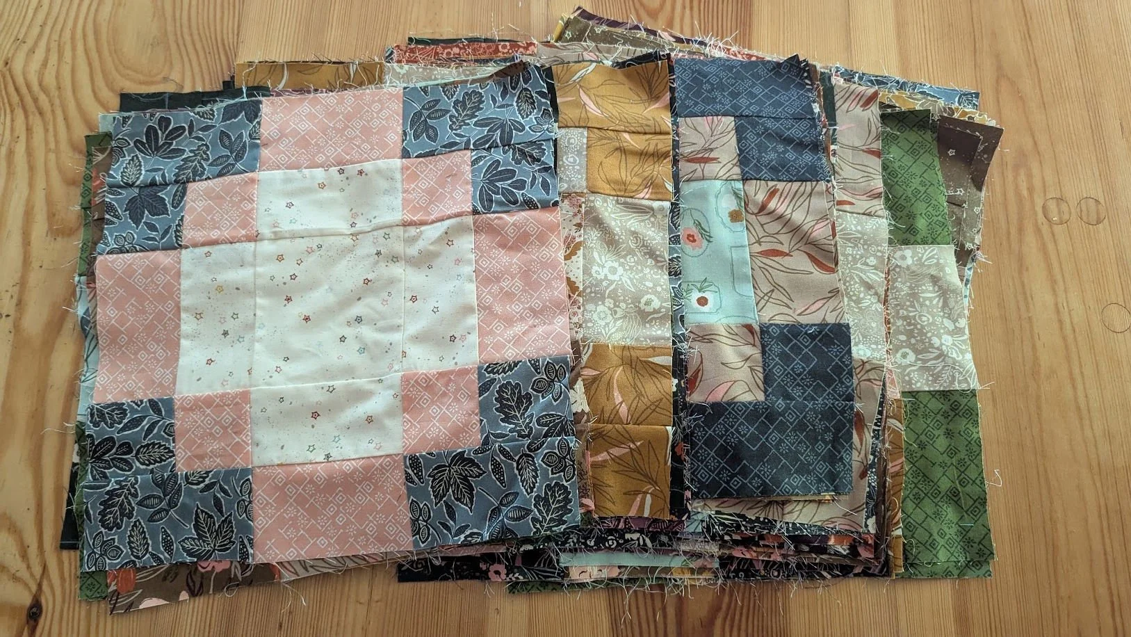 56 large blocks - need to lay out, add sashing and put together