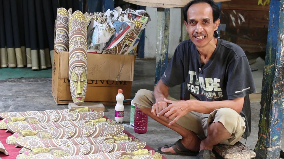 Artisan painting Pekerti masks (source - internet images)