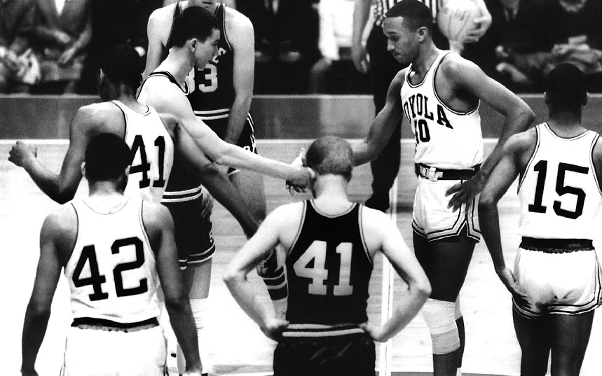 Loyola University vs. Mississippi State tip off in the 1963 NCAA tournament. 