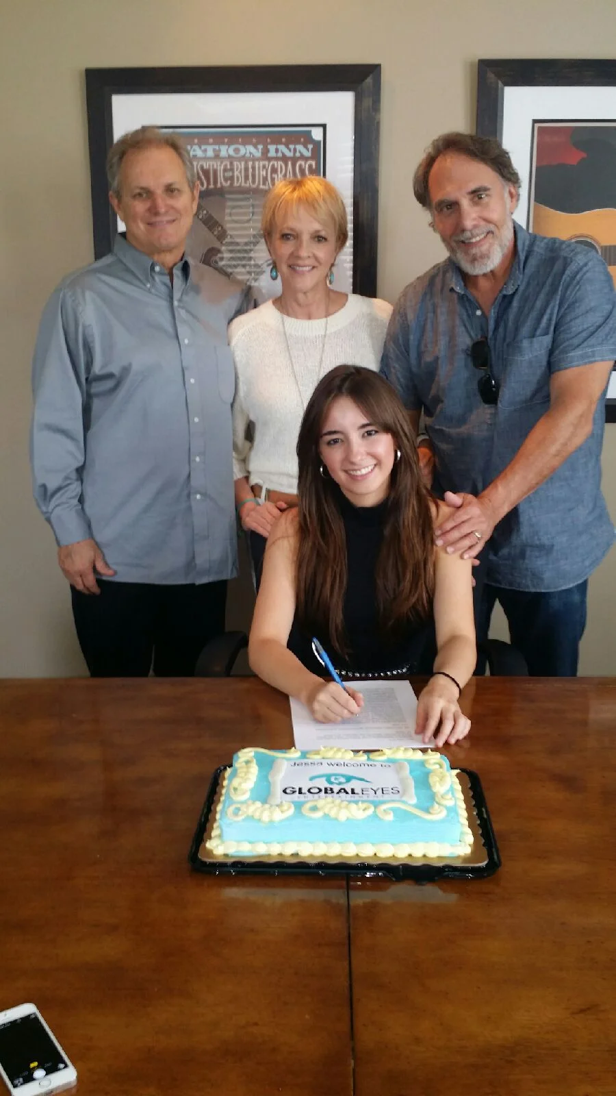 Jessa signing w GEE.jpeg