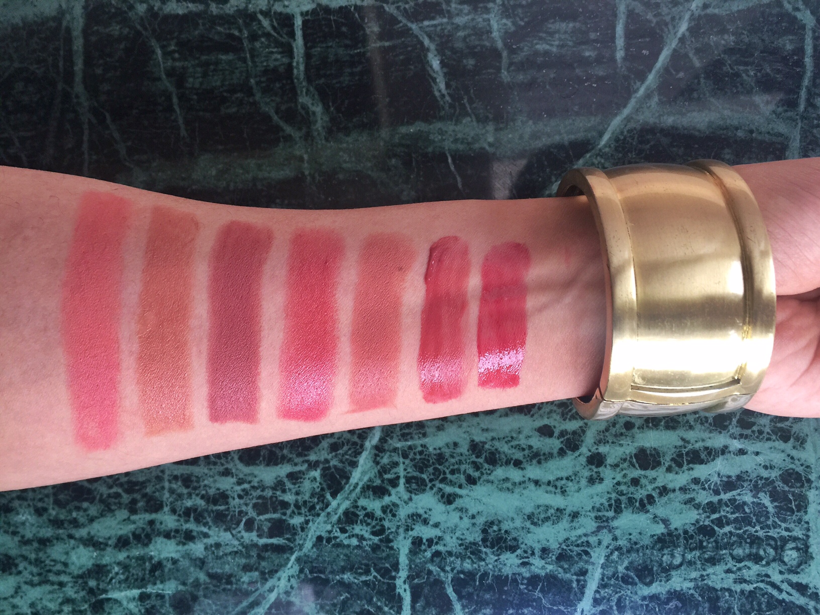 From left: M.A.C Velvetease Lip Pencil in Frolic, Estée Lauder Victoria Beckham Lipstick in Brazilian Nude, Bobbi Brown Lipstick in Brown, Elizabeth Arden Ceramide Lipstick in Coral, Chanel Rouge Allure in Angelique, YSL Baby Doll Kiss & Blush in 10, Smashbox Be Legendary Long-Wear Lip Lacquer in Muted Raspberry.