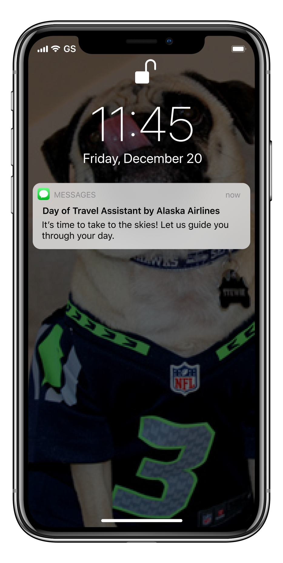 iphone screen with notification reading "Day of Travel Assistant by Alaska Airlines. It's time to take to the skies! Let us guide you through your day."
