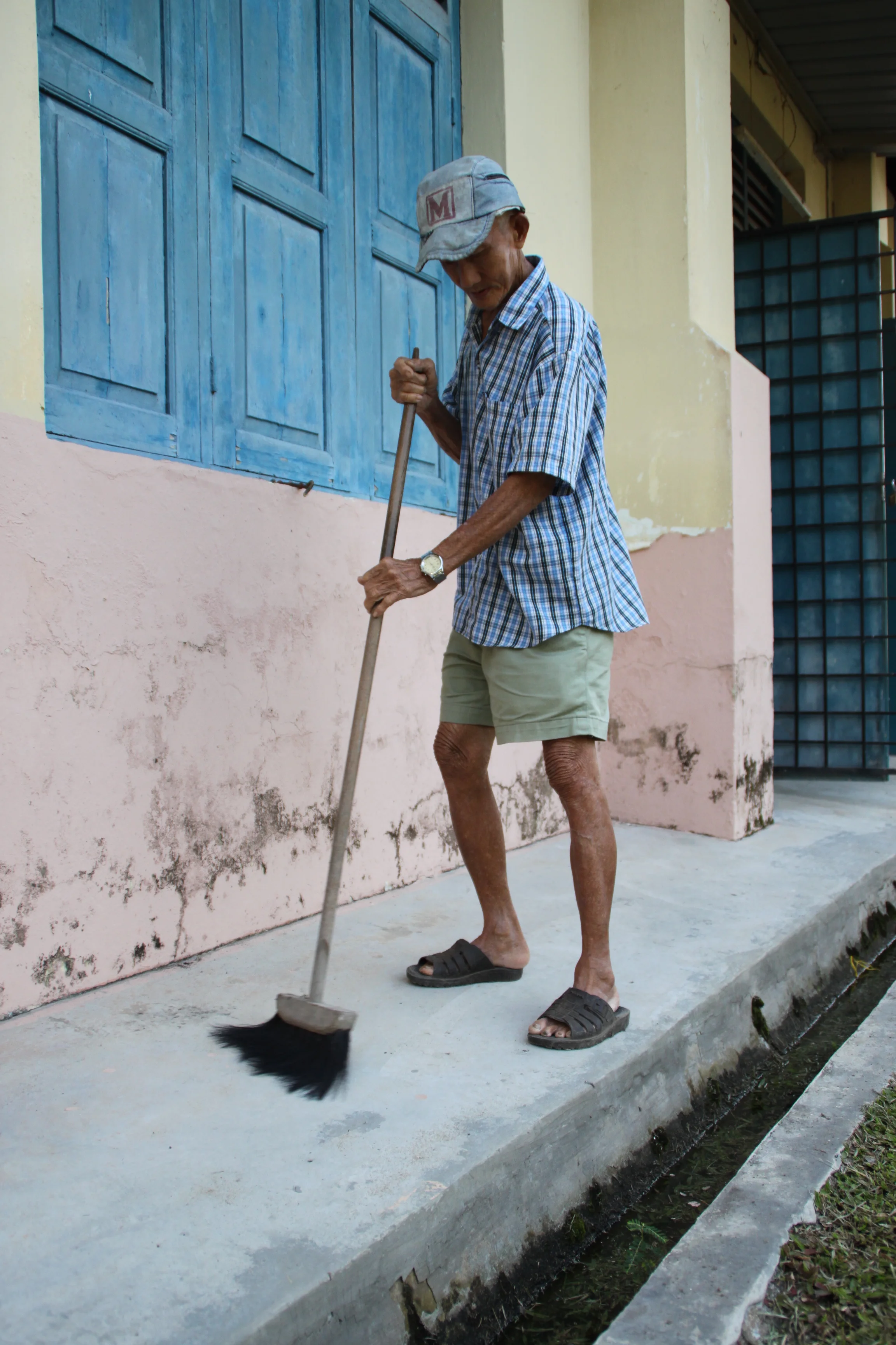 For Ng, his job as a store attendant is very easy and he always complete his job early. (photo by Tan Ean Nee)