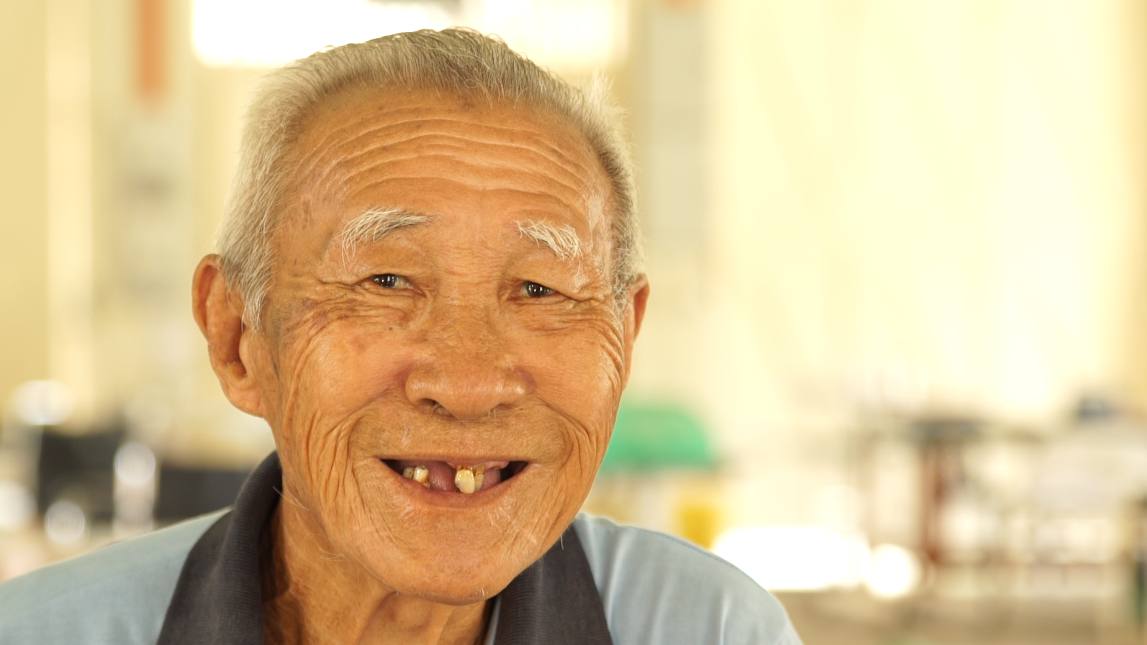 One of Chew’s rare smiles. (photo by Lian Lin Siong )