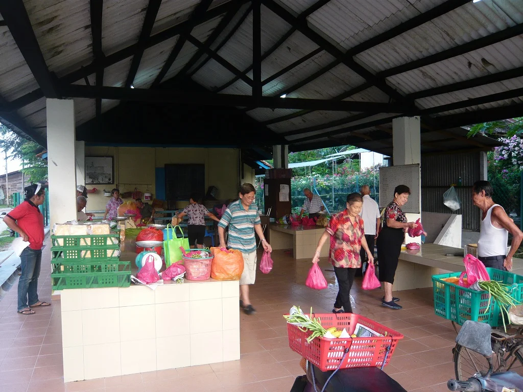 Section attendants busy collecting their allocations for distribution. (photo by Joshua Wong)