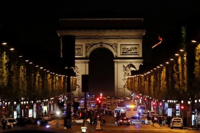 Champs Elysee Shooter Leaves Questions of IS Involvement 