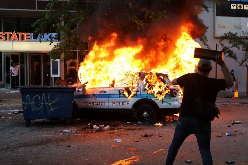  Protesters burned down a Chicago PD car. 