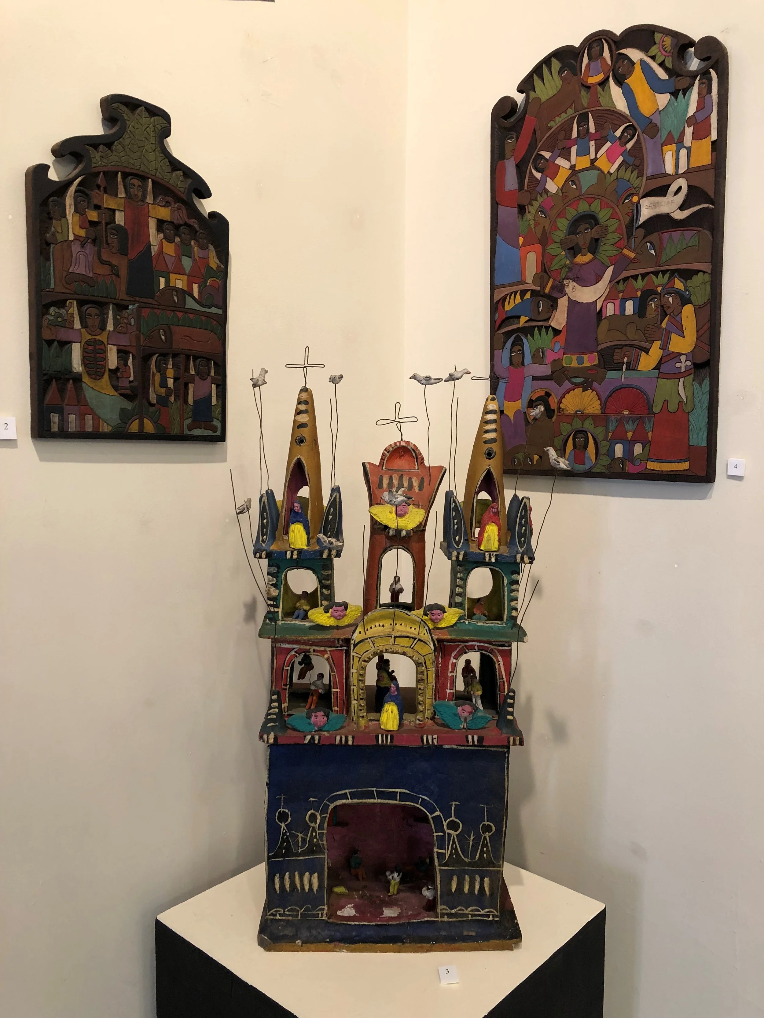 Three of the many objects brought home from vacation on view in the current exhibit until December 2019.