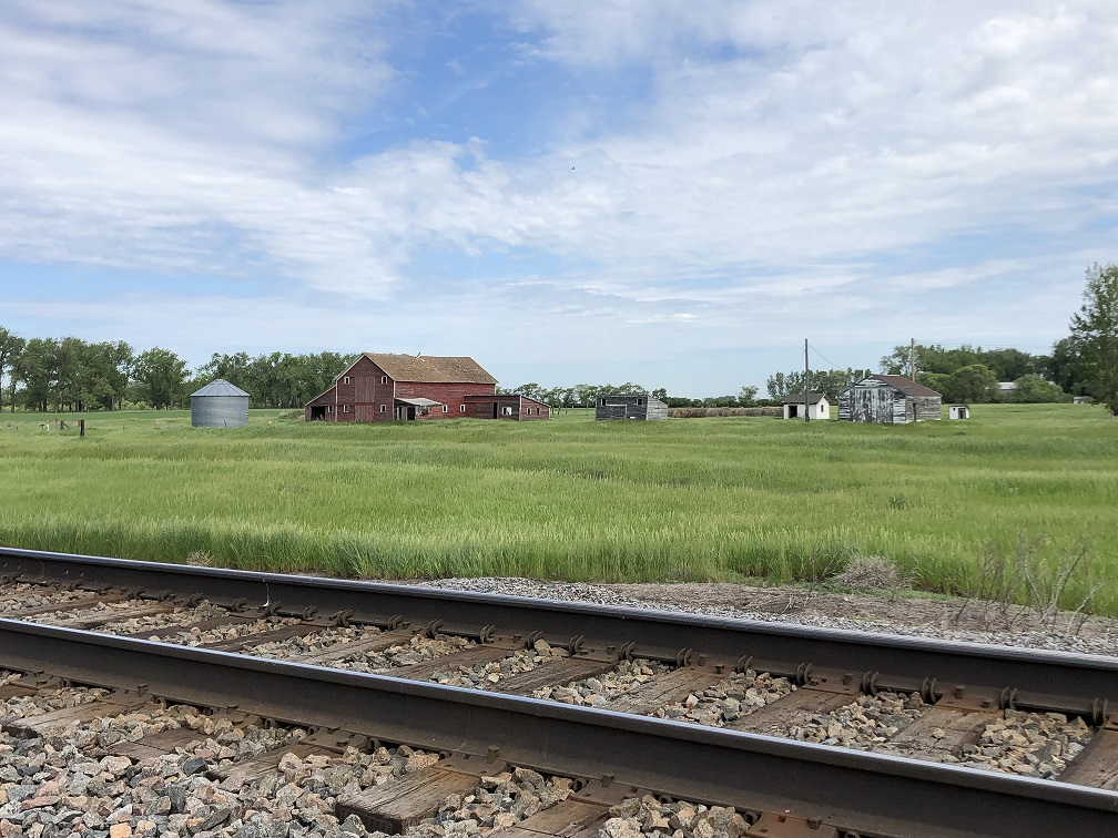 Troy Farm with Railroad tracks in front.png
