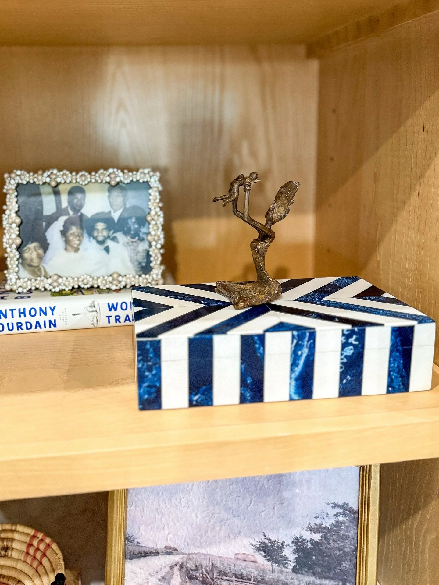 Quick design tip for when you're picking pieces: Add a mix of pretty AND sentimental items that reflect your individual life.

For example, this client always puts her kids at the forefront of her decisions. So, when I saw this beautiful handmade mot