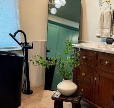 It&rsquo;s all in the details ✨ Transforming this Tuscan-style bathroom into a personalized, modern tropical-inspired oasis&mdash;complete with a sculptural soaking tub, layered natural textures, and a palette that feels fresh, warm, and transportive