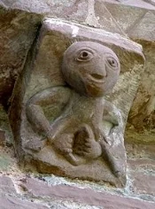 A Sheela-na-Gig on the outside of a church in Ireland
