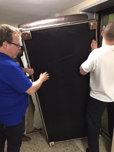 I don't know how they fit that couch into the elevator...magic?