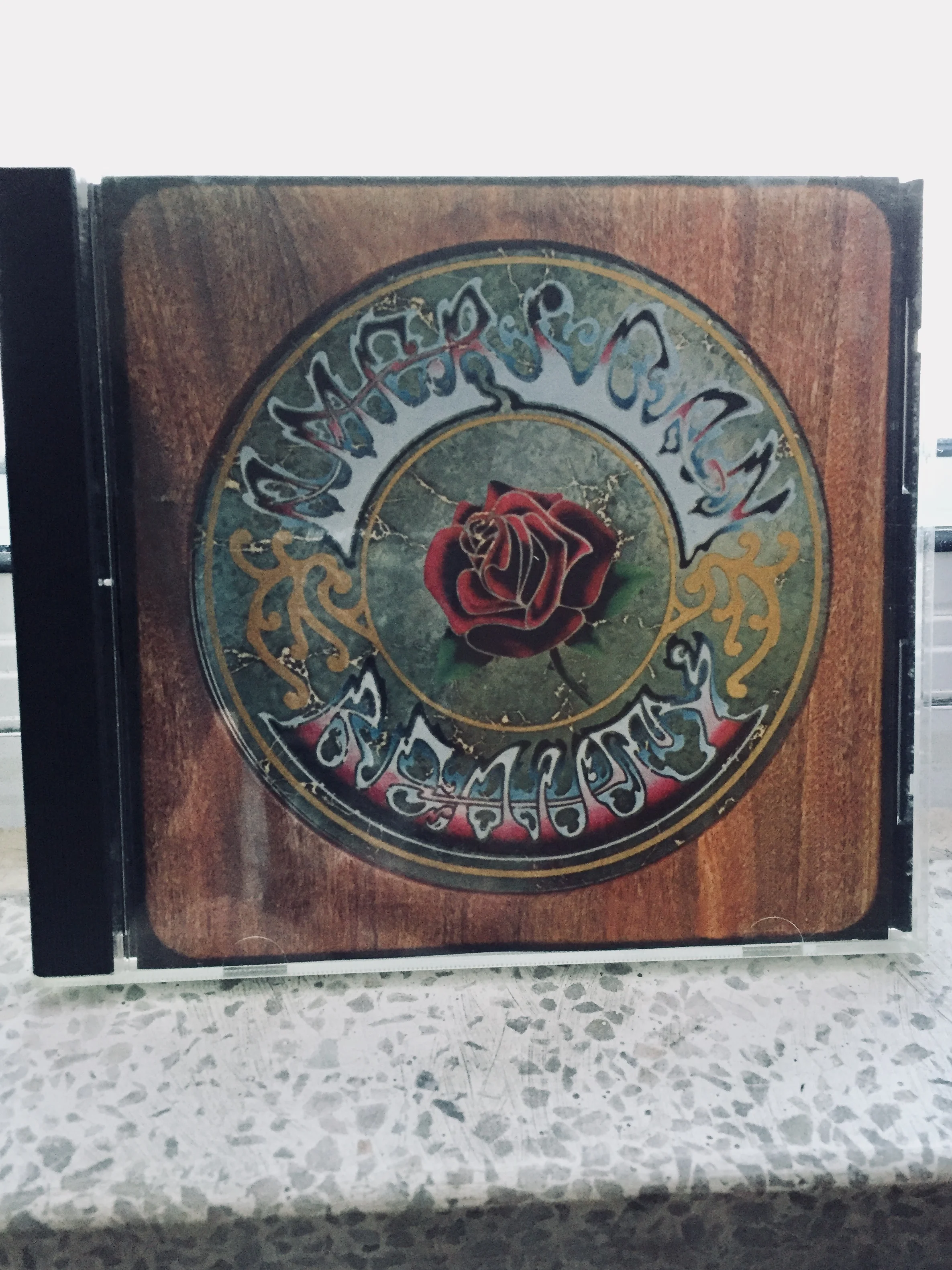 My dad's 'American Beauty' CD by the Grateful Dead. One of the best albums ever made