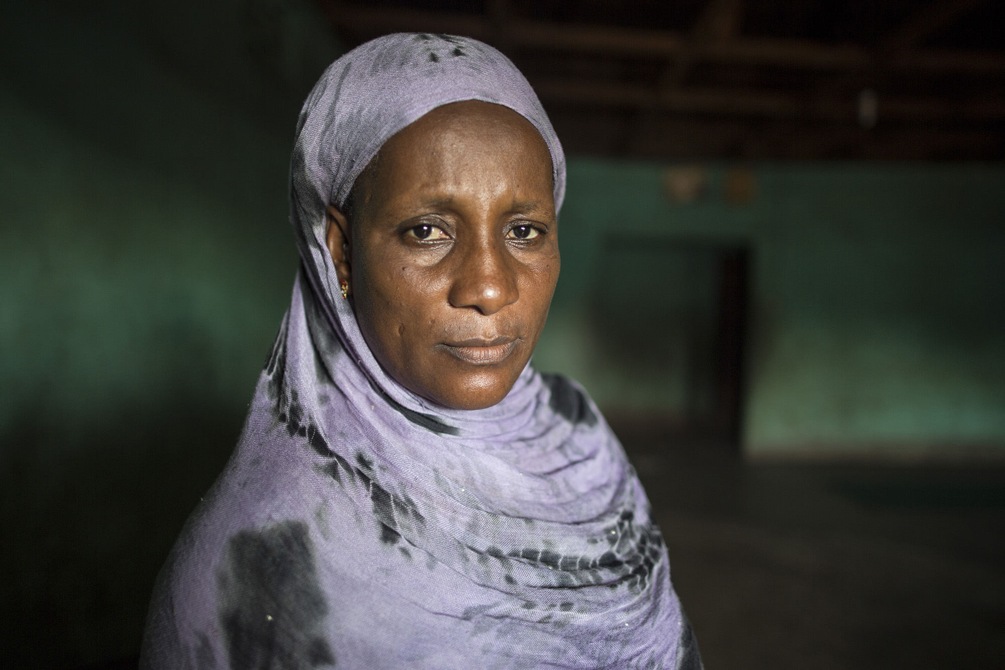 Housseinatou Sangar's step-daughter became ill and her step-son took her to a clinic. The family now believes that the siblings contracted Ebola while at the clinic because another patient was ill. Later, they both passed away from the disease. The