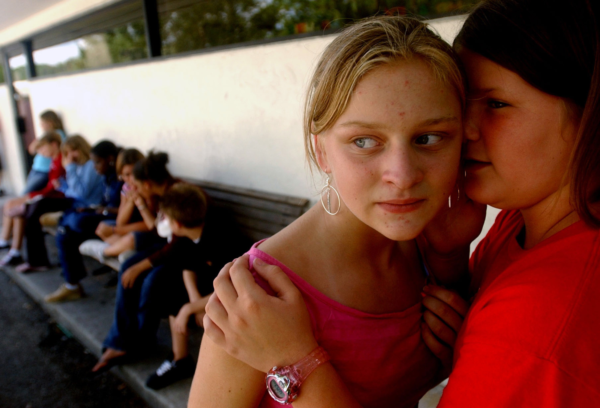  Sloane Moss, 11, right, whispers a secret to Diana Stoneking, 12, about the boy Stoneking likes while the two hang out at the Vero Beach Boys and Girls Club on Tuesday. Moss says that her and Stoneking, who both part of the Junior Staff of the club,