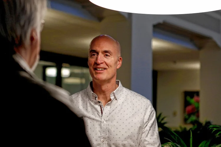Steve Garrow of Kayon Accelerator talks with Eric Crawley of Amherst at AmherstWorks. GAZETTE STAFF/SARAH CROSBY