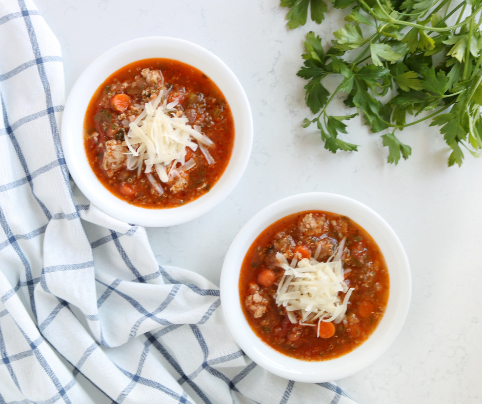 This is one of my family's favorite soup recipes. And I love it because it's loaded with veggies. It's easy to switch up if you don't have all the ingredients on hand or you want to add extra vegetables. Italian Chicken Sausage & Quinoa Soup 1 Tablespoon olive oil 1 lb. Italian chicken sausage* 1/2 large onion, diced 3 cloves garlic, minced 3 large carrots, diced 3 stalks celery, diced 1/2 cup quinoa, rinsed well 1 14 oz can diced tomatoes 4 oz tomato paste 1 quart chicken broth 1 teaspoon Italian herb seasoning 2 t dried parsley 1 zucchini, grated 2 cups mixed greens, chopped (spinach, kale, chard, etc.) Salt & pepper to taste Grated Parmesan, optional Directions Brown sausage with olive oil in large pot over medium heat. Add onion and sauté until sausage is browned and onion is translucent. Add garlic and cook one minute. Add carrots, celery, quinoa, diced tomatoes, tomato paste, chicken broth, and herbs. Cover and simmer 30 minutes or until vegetables are tender. Add zucchini and cook 10 minutes. Turn off heat. Add mixed greens and let stand 5 minutes. Season with salt and pepper to taste. Top with grated parmesan if desired. *Vegetarian option: Replace sausage with 1 can white beans Recipe from Laura Pettit