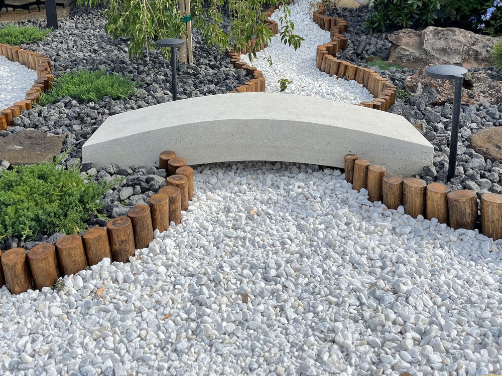  This cast concrete bridge from O’ahu provides a distinctly Japanese-modern aesthetic for the garden. 