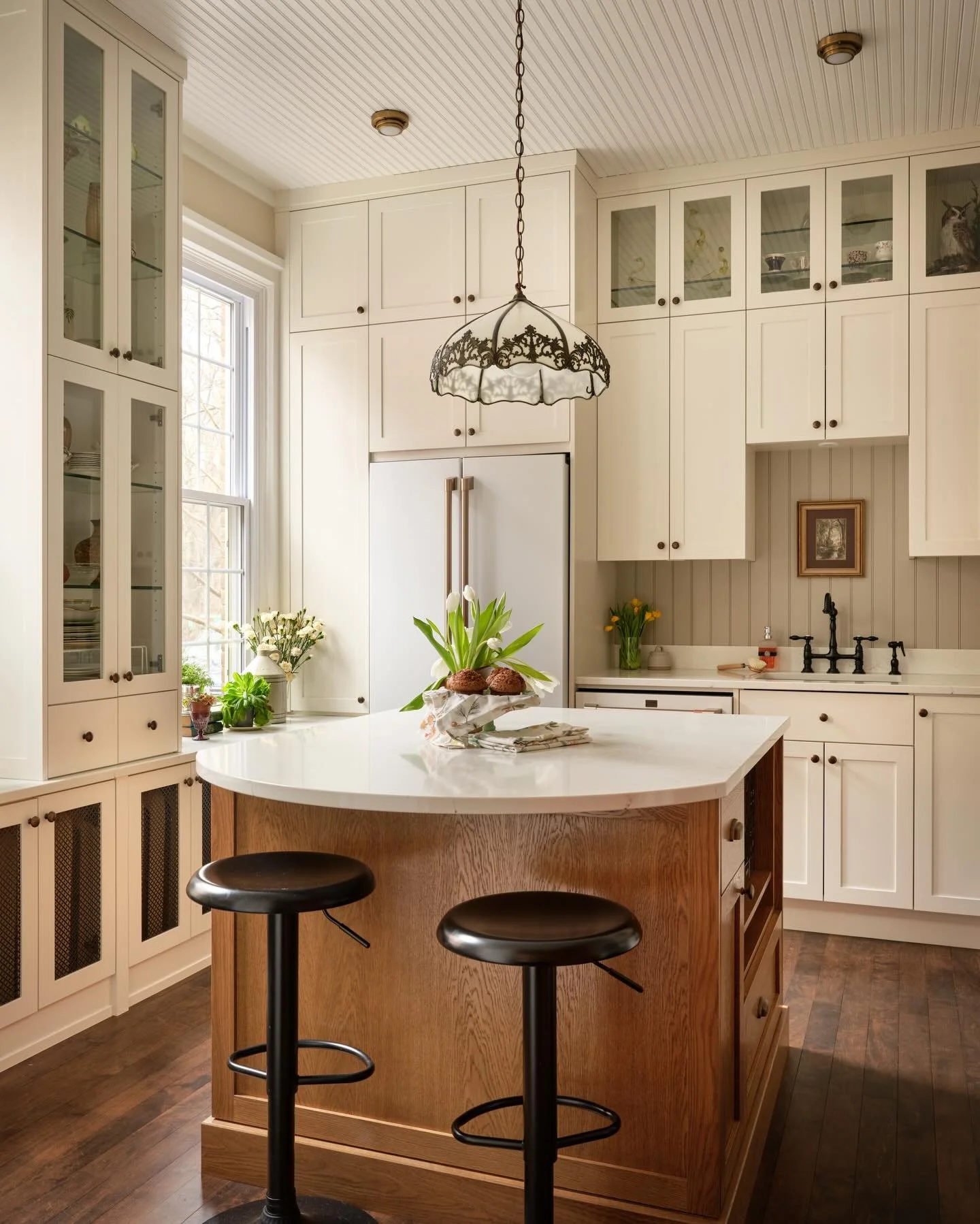 Tight space for a kitchen? No problem. 

This Victorian home had the classic small footprint with lots of windows and doors, making usable space limited. 

Functionally, we maximized the tall ceilings and used the rads under the windows to add extra 