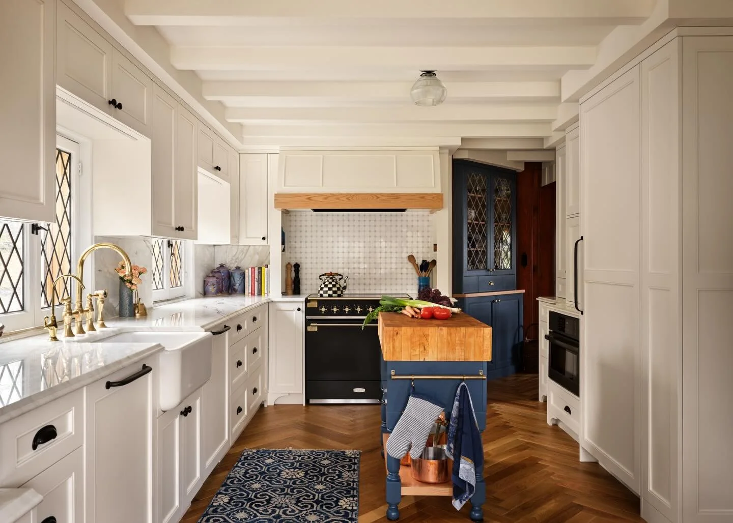 Nothing to say here except that I&rsquo;m in love. 

In love with the herringbone hardwood, in love with the marble countertops and backsplash, in love with the windows, in love with the brass faucets, in love with the reimagined antique butcher bloc