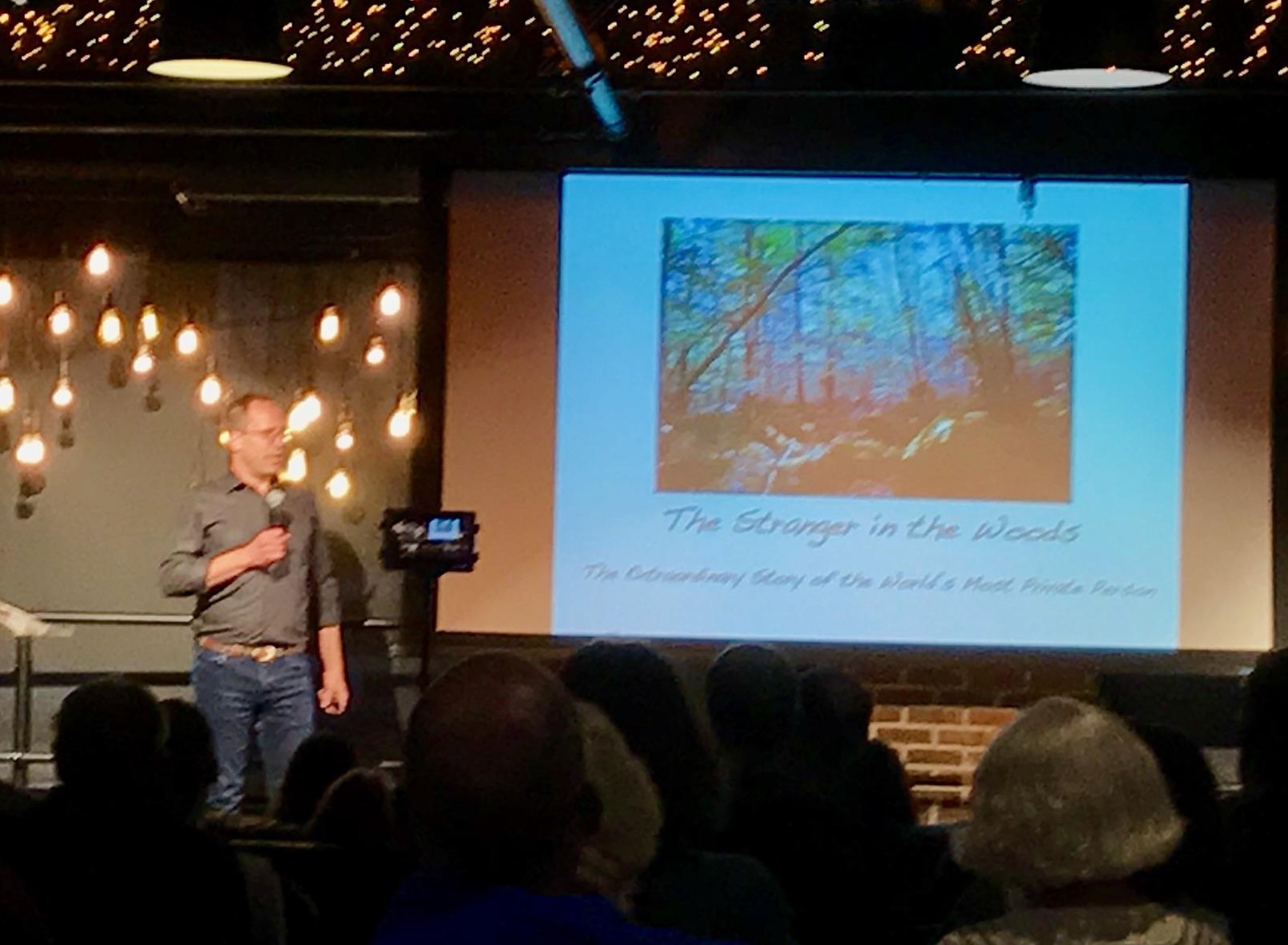 Micheal Finkel discussing his book The Stranger in the Woods at An Unlikely Bookstore & Cafe in Plainville, MA.