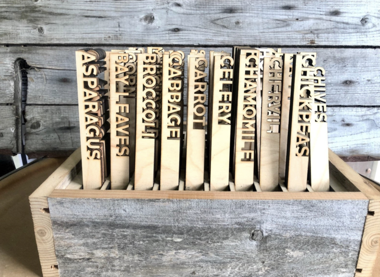 (Pictured: Wooden Herb Markers from WoodnSparksCo on Etsy)