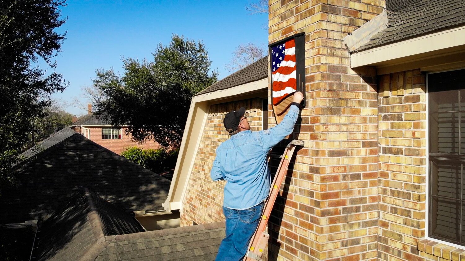 Installing a bat house. Learn more about bat houses here